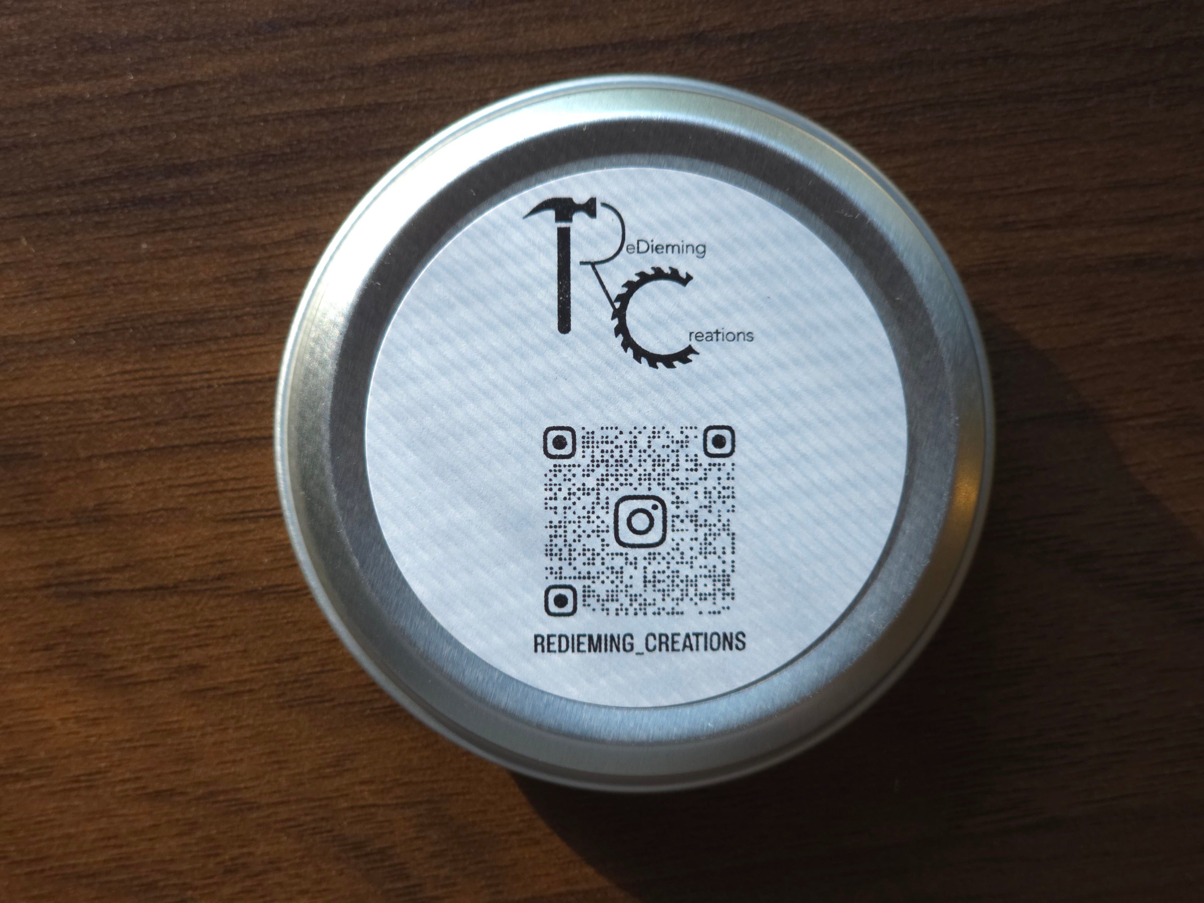 Bottom of board ReDieming Creations board butter wood cutting conditioner with ReDieming Creations logo and instagram QR code