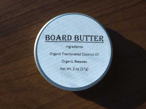 Container of ReDieming Creations board butter cutting board conditioner with label on a wooden surface